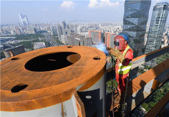 （有修改）（B 科技列表 三吴大地南京 移动版）上海建工多举措促华新城1号塔楼总高破200米