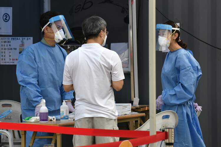 韩国单日新增病例继续增多 疫情造成国会临时关闭