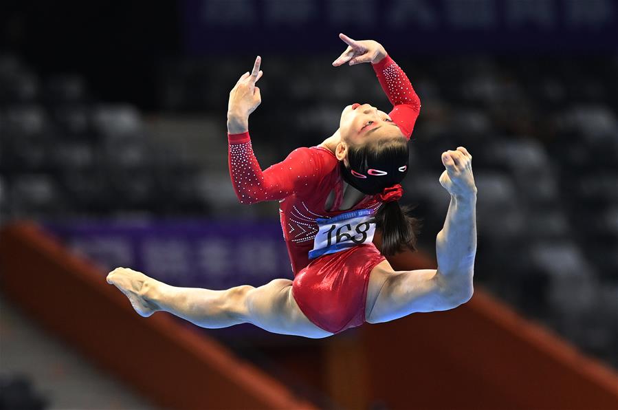 体操——全国锦标赛:广东队夺得女子团体冠军 体操——全国锦标赛:广东队夺得女子团体冠军