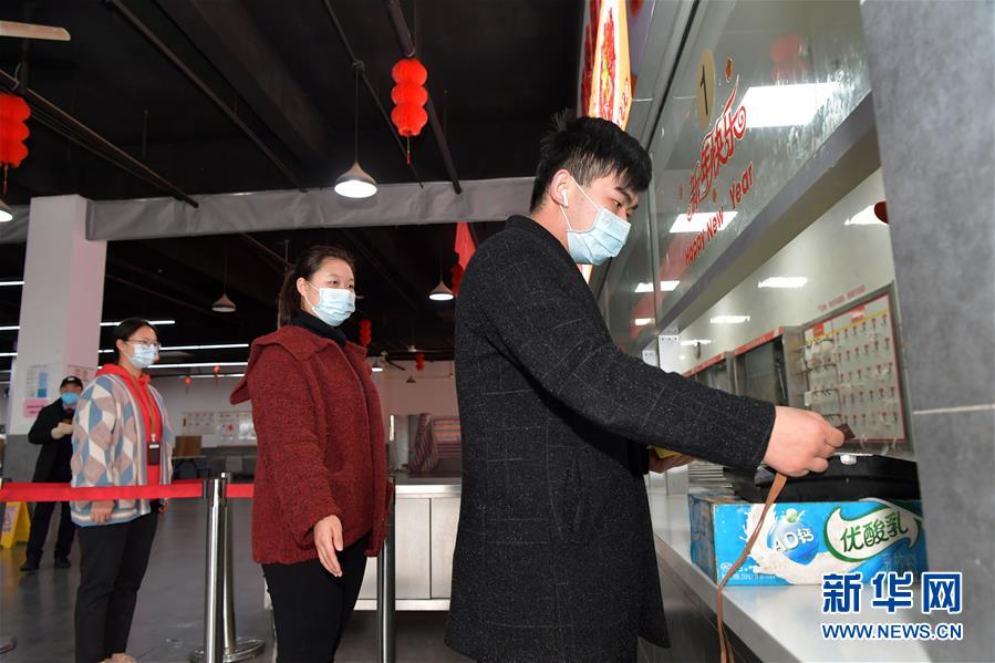 「新华网」江西南昌：复产防疫两不误