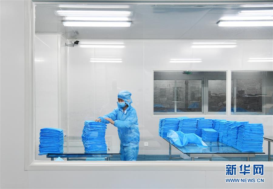 「新华网」医用防护品 生产不停歇