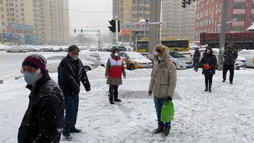 风雪中他们选择坚守 哈尔滨市发改委下沉社区干部“卡点”记事