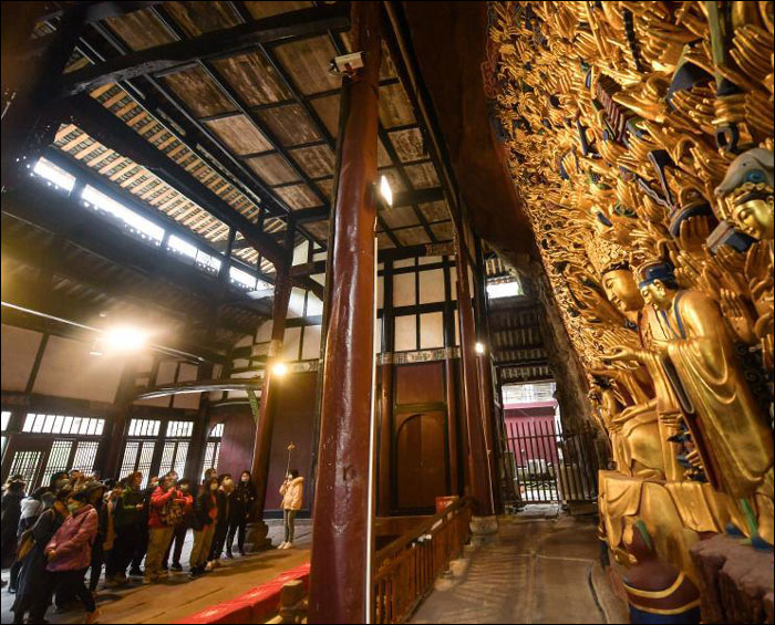 นครฉงชิ่งทุ่มกำลังอนุรักษ์งานพุทธศิลป์หินผาต้าจู๋