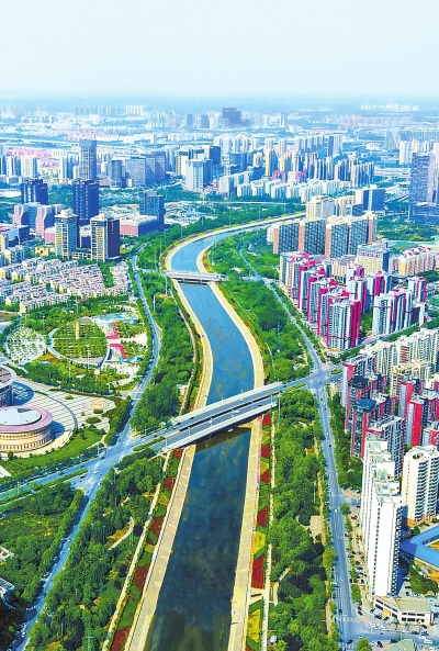 【旅游资讯-文字列表】郑州市郑东新区七里河河畔人行绿道春意盎然
