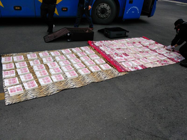 图片默认标题_fororder_查获的假钞-供图-广元市公安局