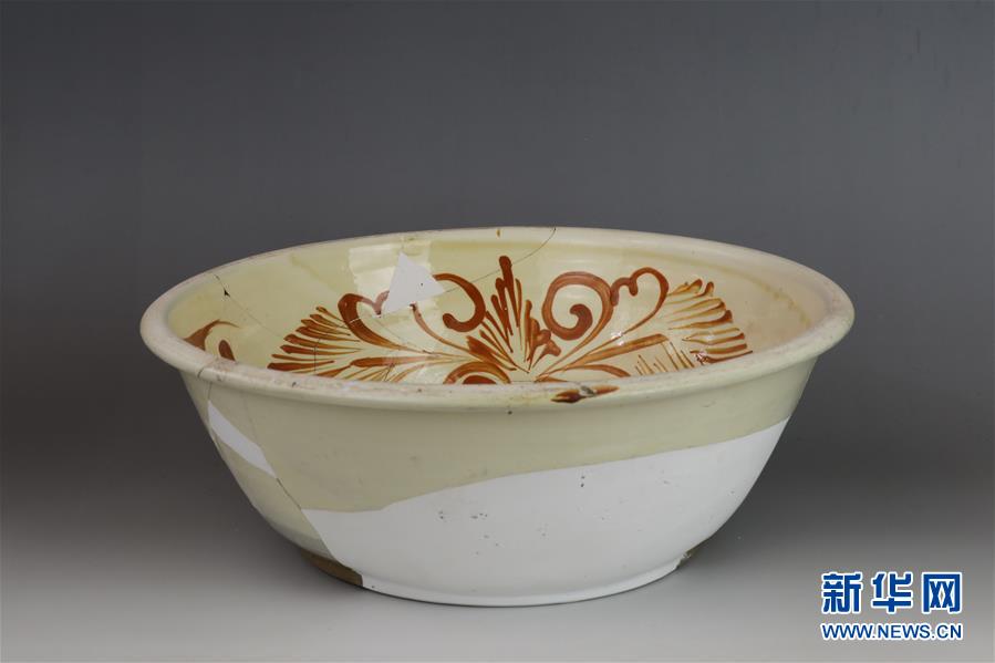 新华网■山西吕梁首次考古发现北宋“柿色彩”瓷器