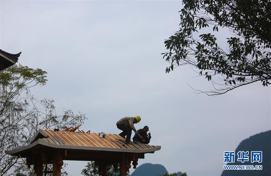 广西融水:“打包”搬迁 苗寨起“新”楼 广西融水:“打包”搬迁 苗寨起“新”楼