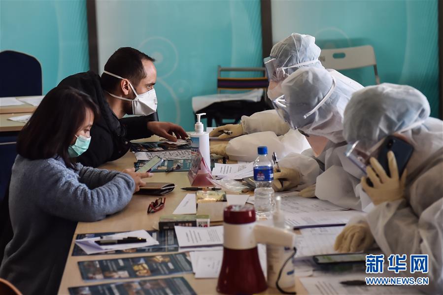 【新华网】北京新国展入境人员转运集散地见闻