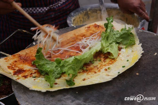 煎饼摊主高薪背后是“高辛”:每天工作超15小时