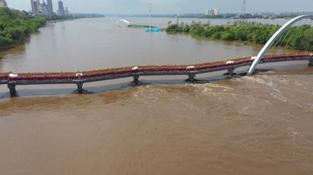 全国で河川17本 警戒水位超える洪水が発生 水利部_fororder_网3-0629-1.JPG