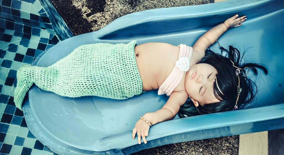 萌萌哒越南六个月胖宝宝化身美人鱼高清组图