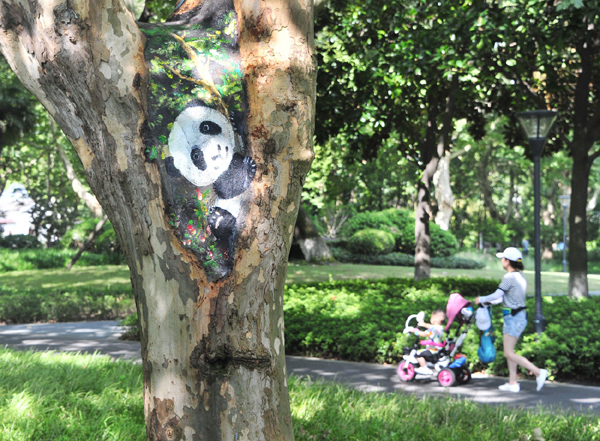 51 pinta sa mga butas ng puno sa Parke ng Zhabei sa Shanghai, patok sa maraming turista 51 pinta sa mga butas ng puno sa Parke ng Zhabei sa Shanghai, patok sa maraming turista_fororder_20210901Zhabei9600