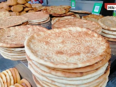 सिन्च्याङको नानद्वारा पश्चिमको झूट भंग