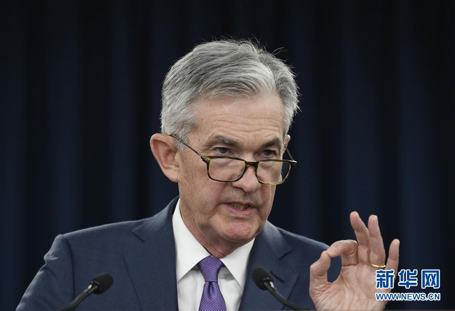 美联储宣布十年多来首次降息(组图)