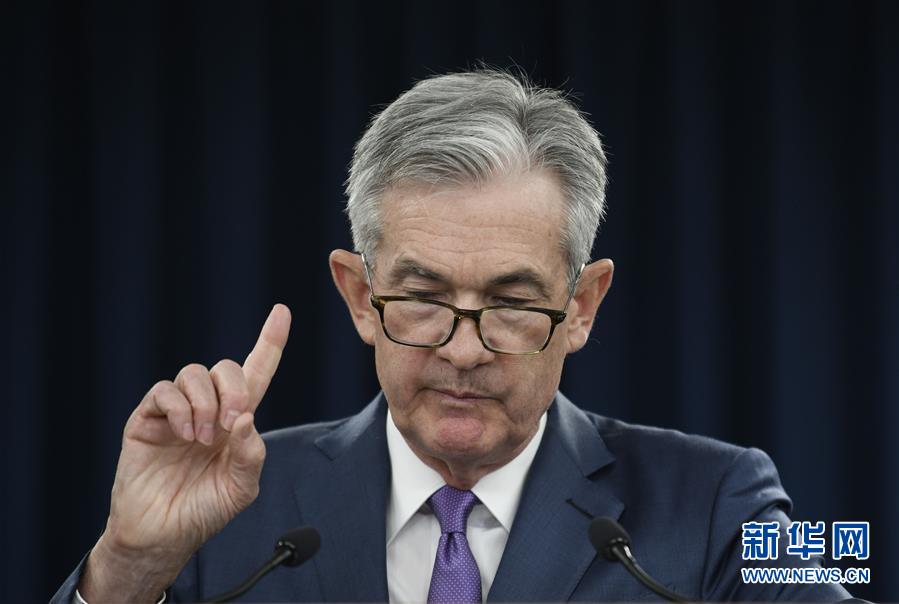 美联储宣布十年多来首次降息(组图)