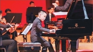 【暂不签】与莫扎特“同台演出”  武汉小学生维也纳表演钢琴独奏