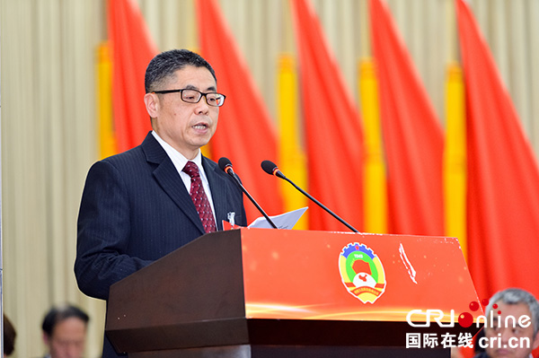图片默认标题_fororder_政协副主席张平作区政协第九届常务委员会提案工作报告（摄影-廖志全）