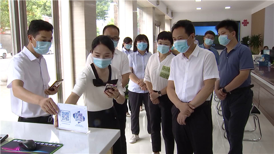 信阳市罗山县委书记周哲调研指导基层治理和集体经济发展工作