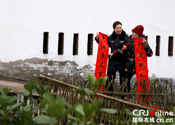 图片默认标题_fororder_送春联-摄影--郑继明