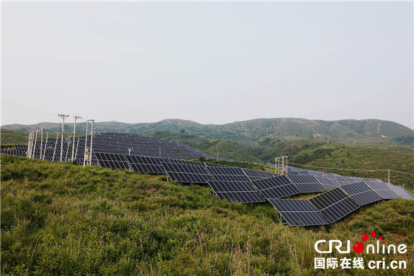 Solar power stations drive more than 10,000 poor households out of poverty in Huludao, China_fororder_11
