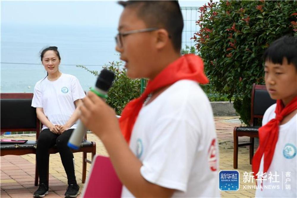 [新华社]面朝大海，静待花开——青岛灵山岛学校张丽老师采访笔记