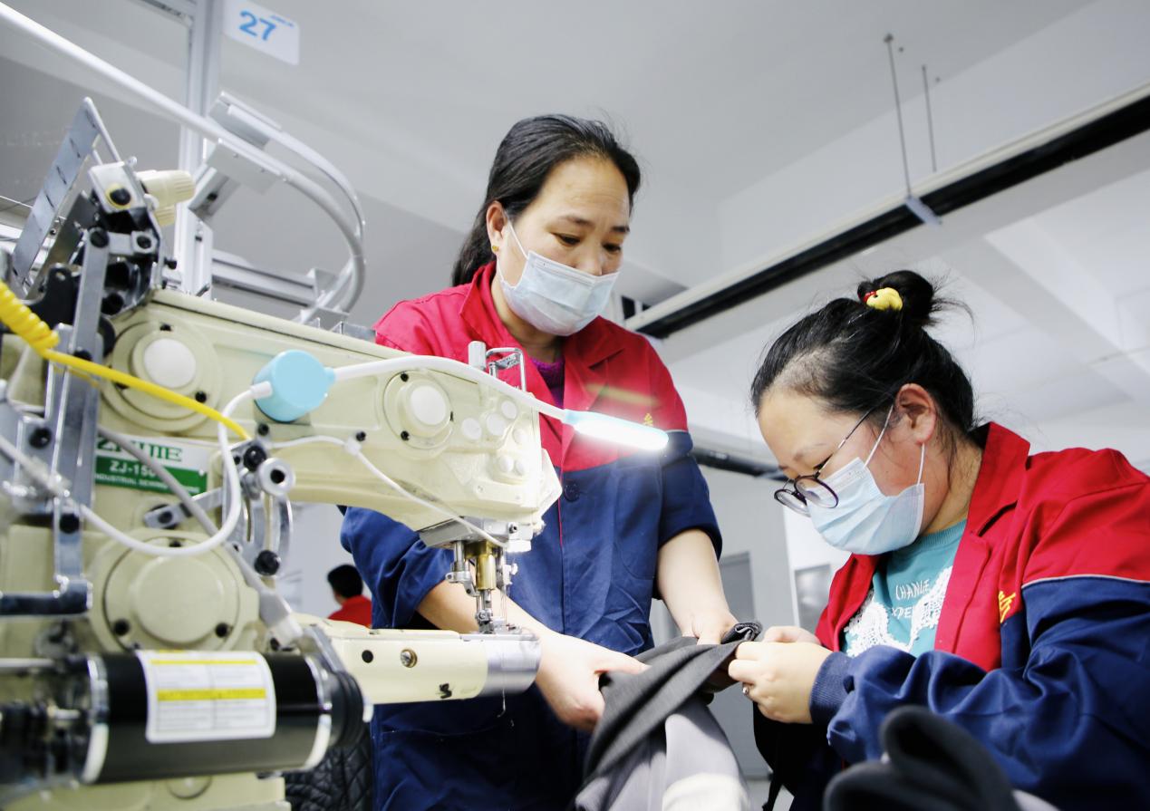 (原创)【组图】河北肃宁:擦亮中国针纺服装名城“金名片”_fororder_20230107_115159