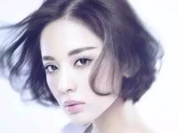 汪明荃69岁生日合影奥运选手 收到猪猪生日蛋糕