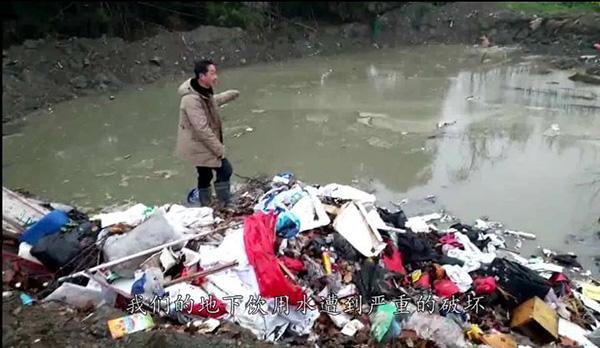村干部举报垃圾非法倾倒后频遭报复 家深夜被打砸