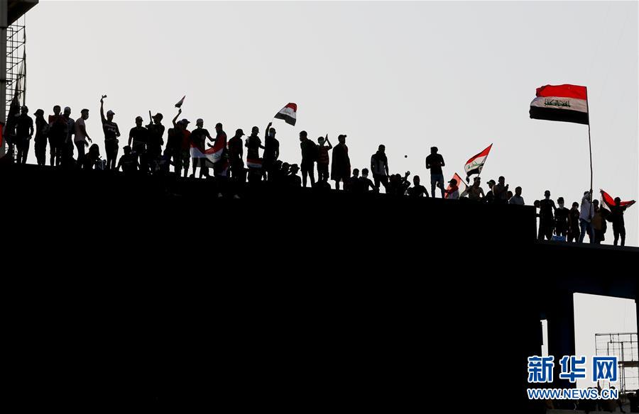 新华网@伊拉克新一轮示威抗议死亡人数升至63人