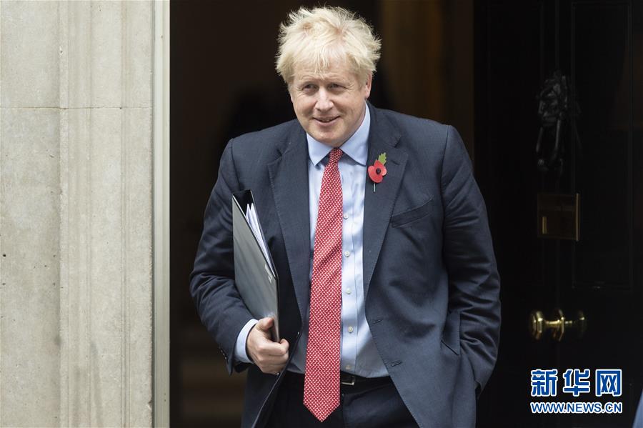 「新华网」英国议会下院通过提前大选法案