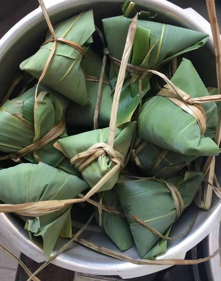 资讯有故事丨包粽子 赛龙舟 端午节过出“国际范儿”