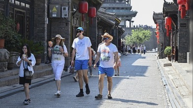 擴大免簽帶動來華旅游熱 海外網友表白中國：“去過還想去！”