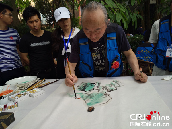 图片默认标题_fororder_画家现场作画-摄影张勇