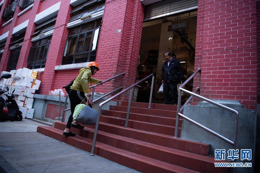 「新华网」家在澳门——“卖鱼佬”关伟铭：在文化交汇中丰富人生