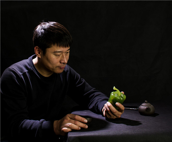 中国玉石巧雕大师唐勇蔬果玉雕作品成第三届中国工业设计展览会亮点