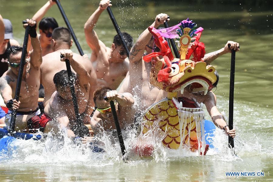 People across China enjoy threeday holiday during Duanwu Festival