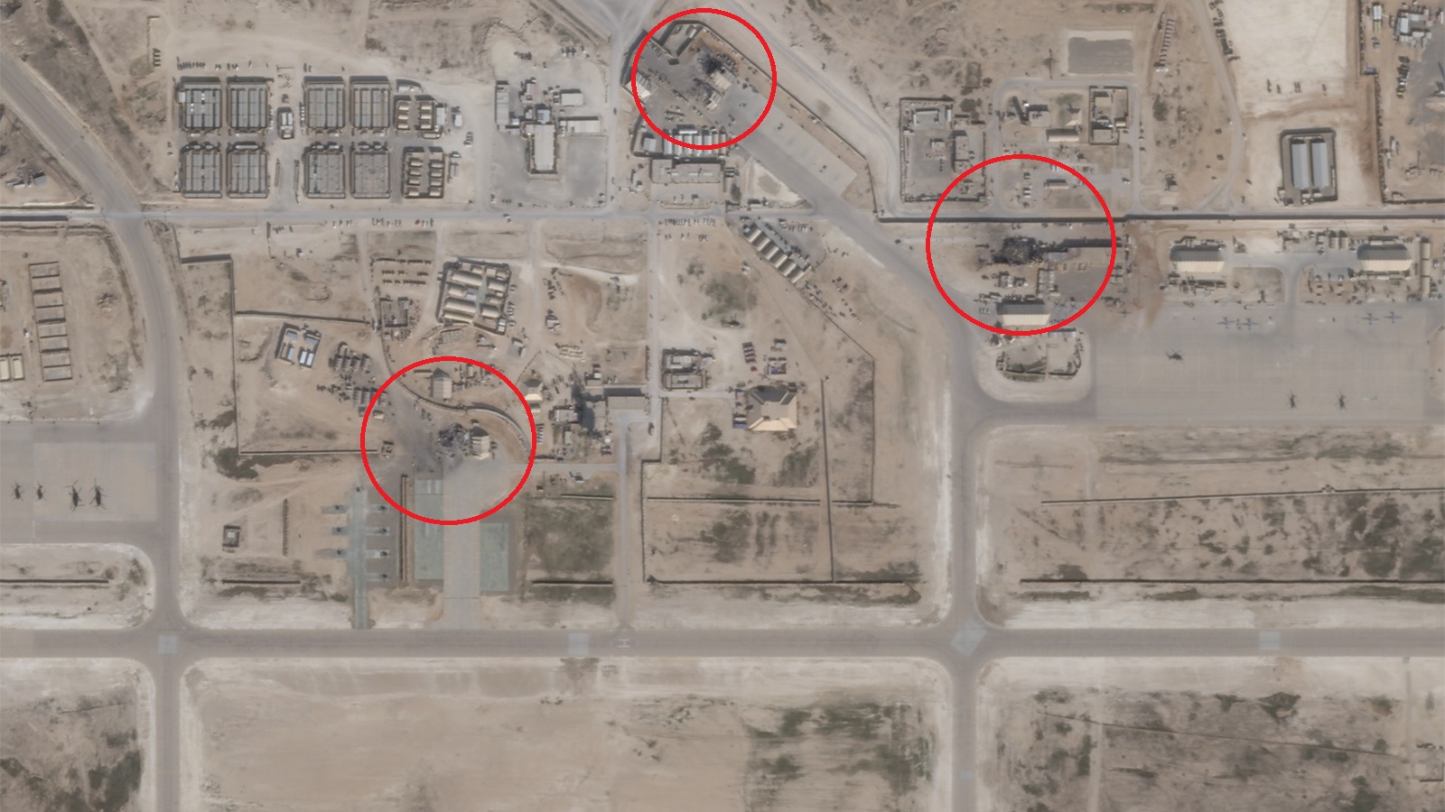 美媒：航拍图像显示阿萨德空军基地四座建筑遭到损坏_fororder_20200109121653128