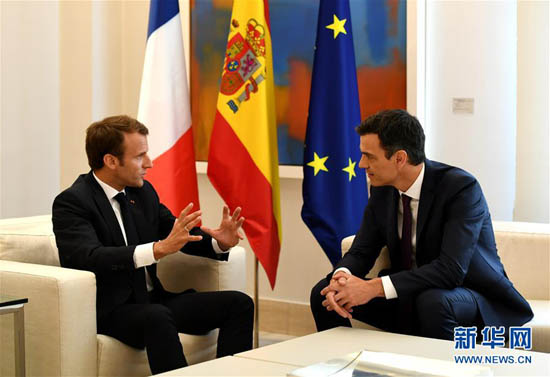 图片默认标题_fororder_法国总统马克龙7月26日在马德里（图左）与西班牙首相桑切斯举行会谈