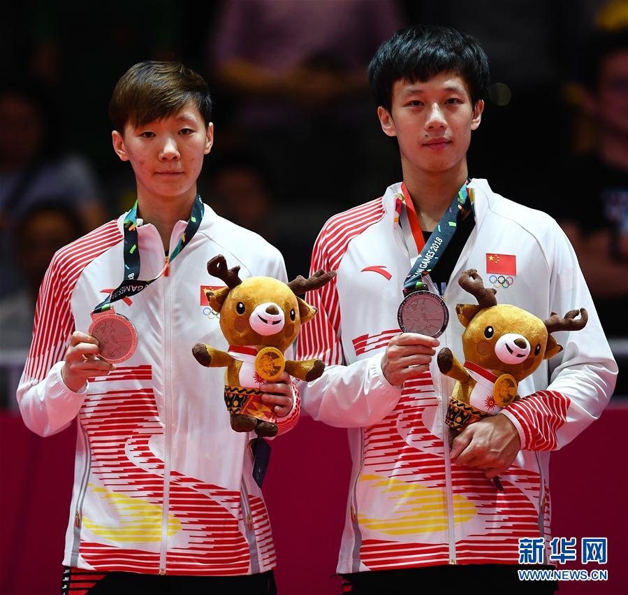 当日,在第18届亚运会乒乓球混合双打决赛中,中国组合王楚钦/孙颖莎以