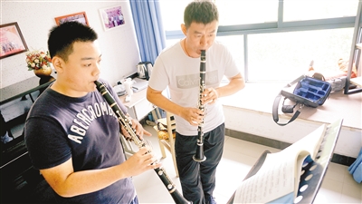 【科教 图文】去年清华今年北大 单簧管老师的“造才记”