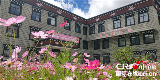 图片默认标题_fororder_新建的业务大楼（稻城县委宣传部 供图）