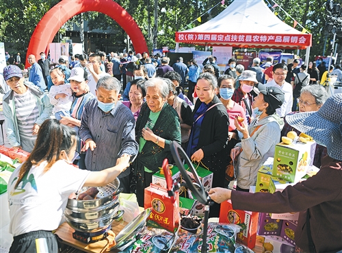 【企业频道+企业扶贫】第四届定点扶贫县农特产品展销会开幕_fororder_res01_attpic_brief