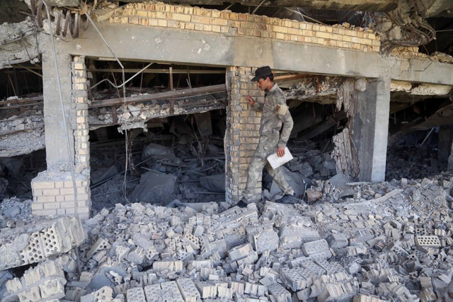 伊拉克政府军与IS交战 萨达姆坟墓遭轰炸