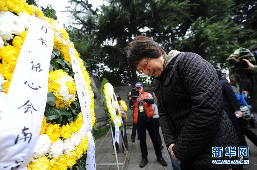 南京大屠杀幸存者及遇难者亲属举行“清明祭”