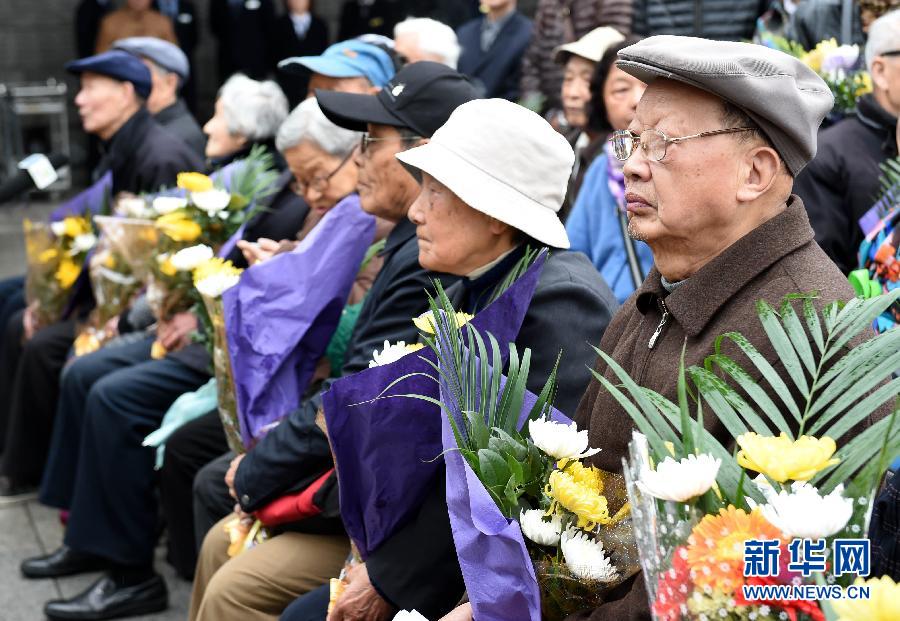 南京大屠杀幸存者及遇难者亲属举行“清明祭”