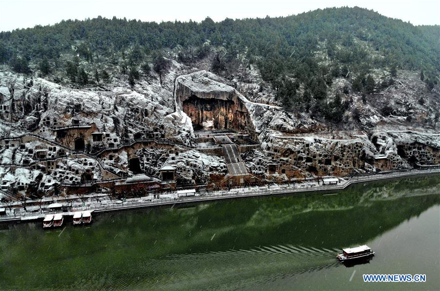 In pics: snow-covered Longmen Grottoes in Luoyang, C China's Henan