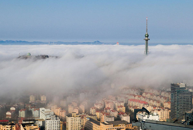 雲端之美 攝影師拍攝大都市“仙境照”