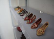 济南老鞋匠打造"微型皮鞋" 最小鞋仅8毫米