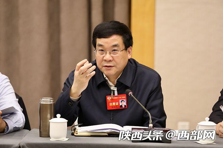 两会表情：履职进行时 政协委员热议报告气氛热烈