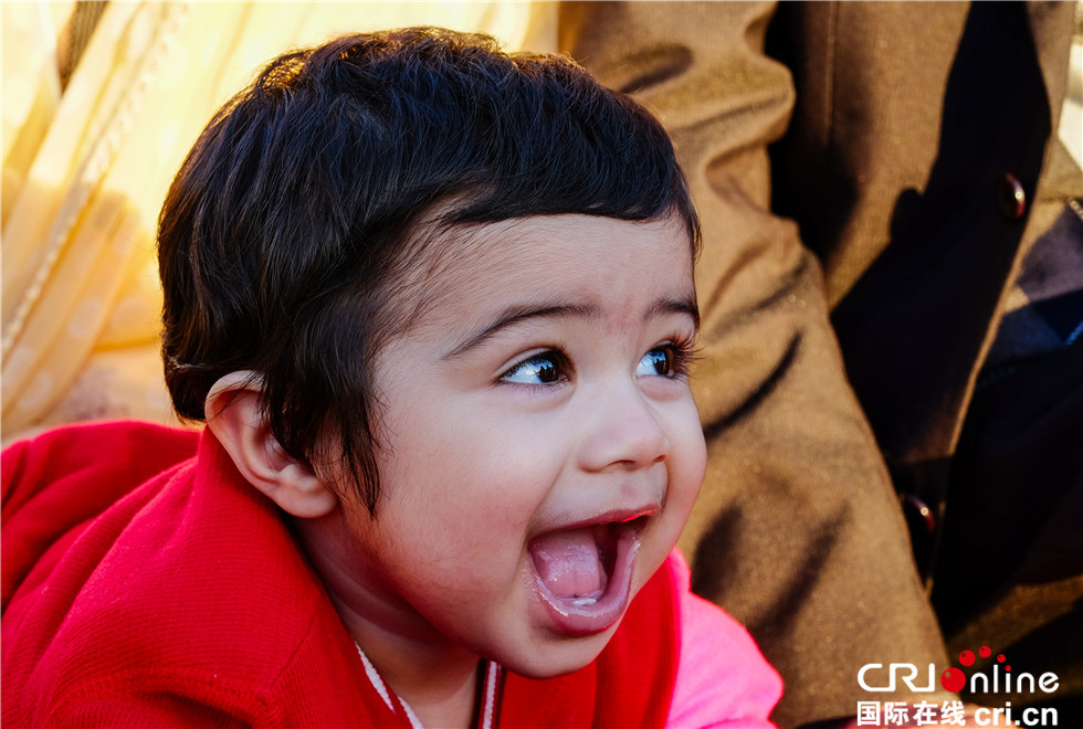 圖片默認標題_fororder_001圖一：巴基斯坦愛笑的孩子（曹凱）
